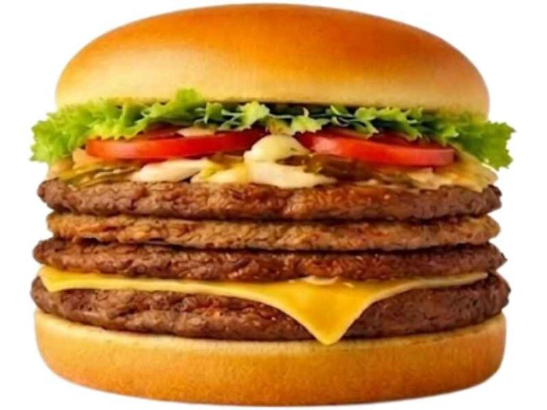 Triple Meat Whataburger with three beef patties lettuce tomatoes pickles onions mustard on a toasted bun